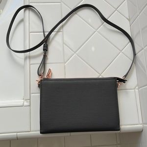 Beautiful crossbody bag with Rose gold metal trim